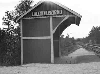 RR stop with sign reading Highland